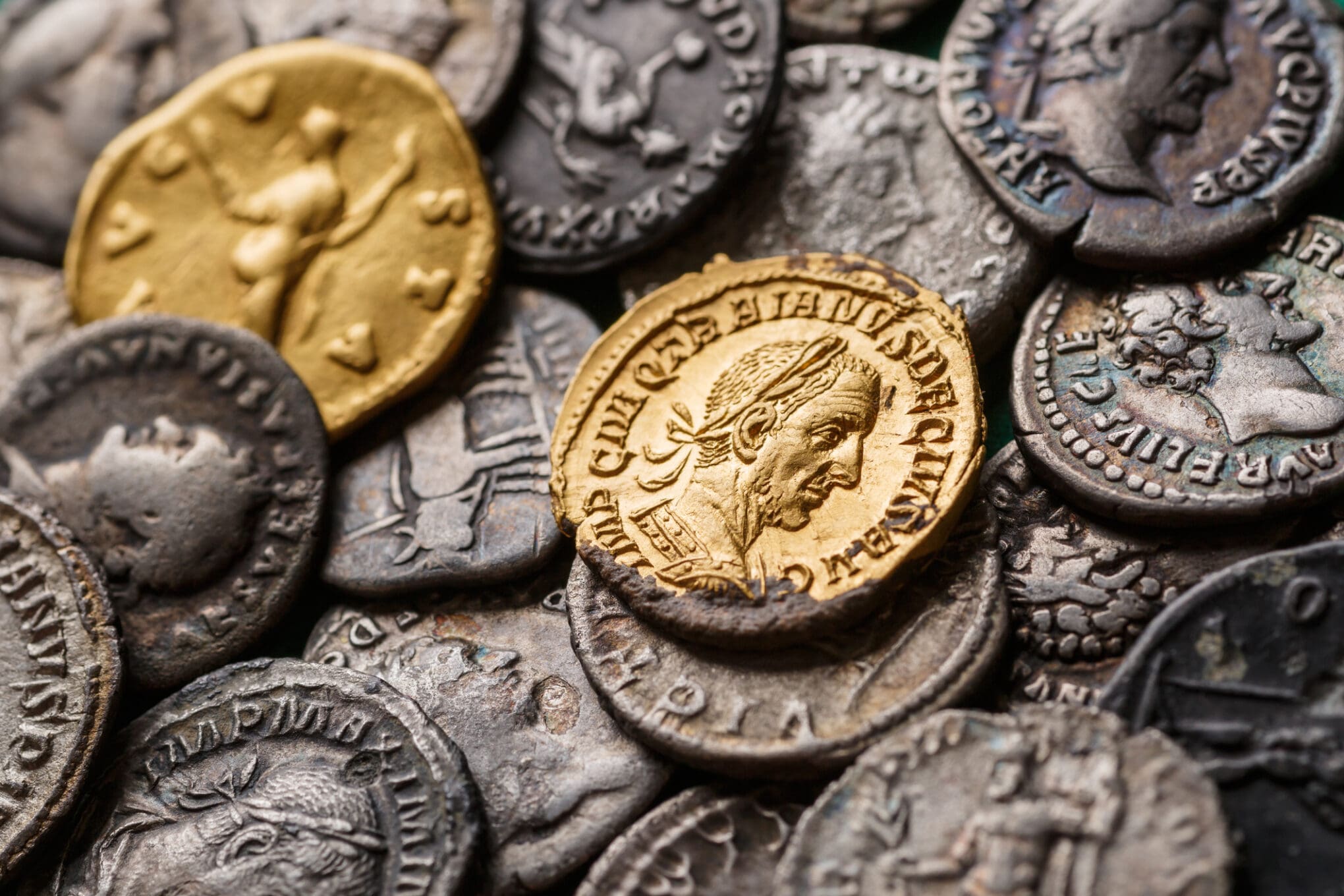 A treasure of Roman gold and silver coins.Trajan Decius. AD 249 251. AV Aureus.Ancient coin of the Roman Empire.Authentic silver denarius, antoninianus,aureus of ancient Rome.Antikvariat.